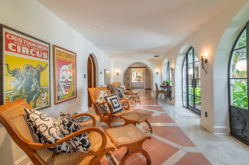 A large sitting room overlooks the yard.