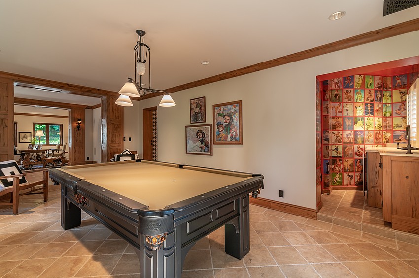 One of the luxury rooms is a billiard room.