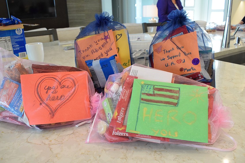 About 16 children in Lakewood Ranch help with the gift bag initiative by writing thank you notes for Manatee County Sheriff's Office deputies. At least 30 people were involved in creating the gift bags.