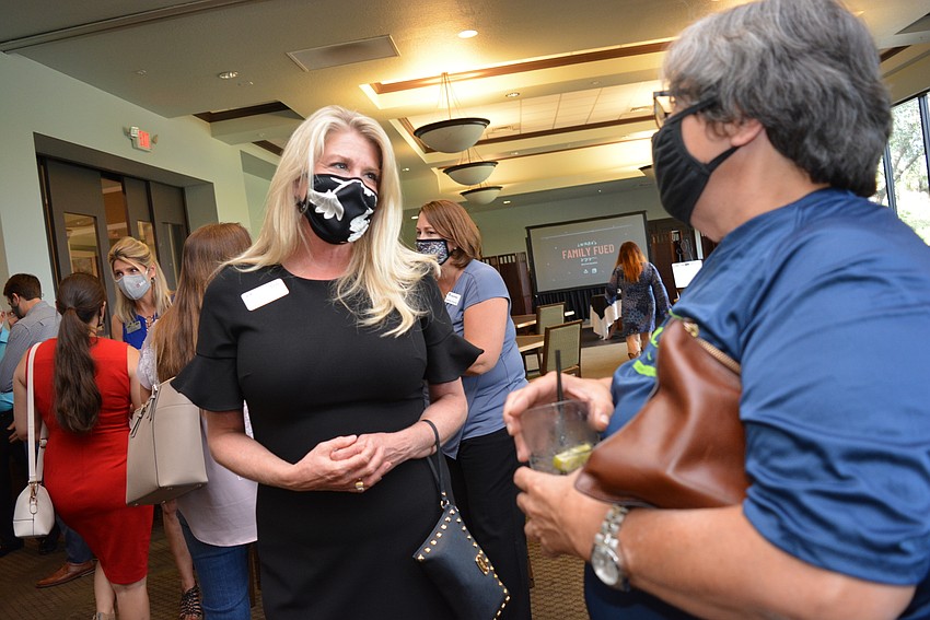 Lakewood Ranch Business Alliance Board Chairwoman Lisa Kirkland meets member Lidia Haim, of Cool Today.