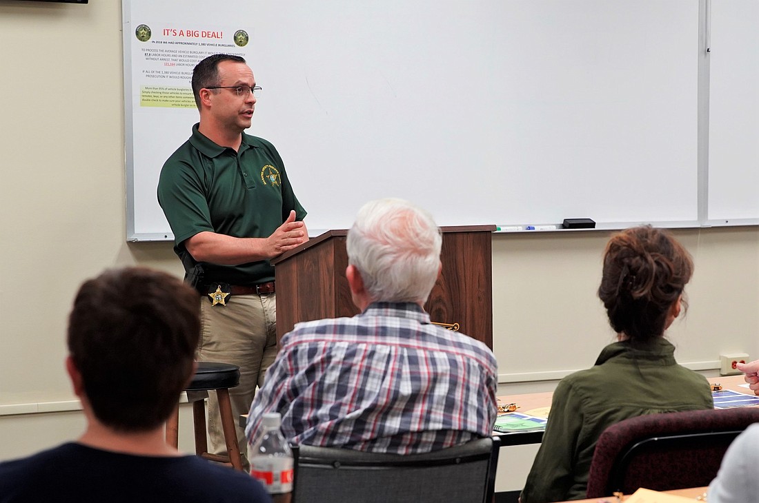 Lt. Robert Andrews with the Crime Prevention Unit of the Manatee County Sheriff&#39;s Office gives an education presentation to residents. The Crime Prevention Unit will host a webinar on COVID-19 scams. Courtesy photo.
