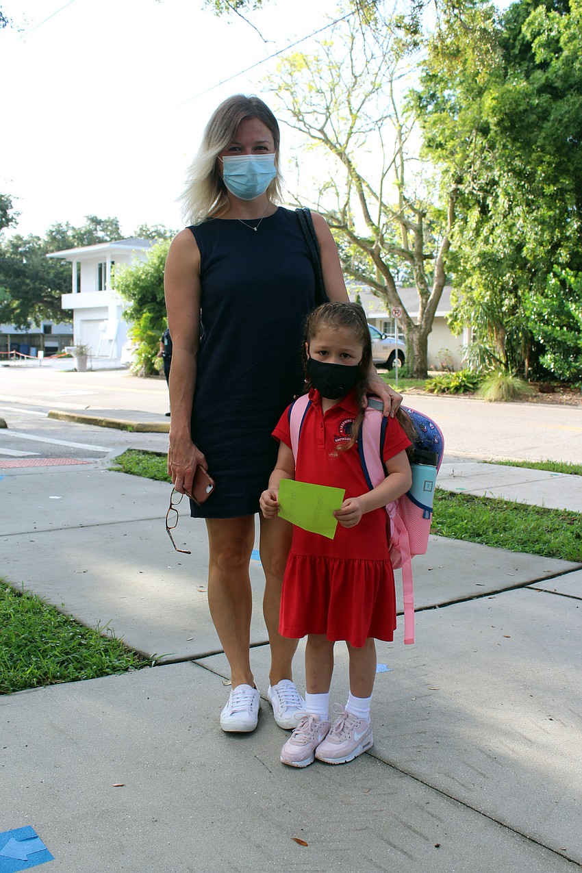 Tamara Klimoba hugs Danica Plotkin before her first day of kindergarten at Southside Elementary School. Brynn Mechem