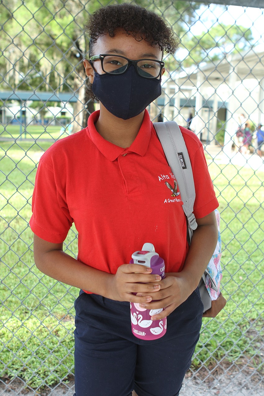 Analeigh Johnson, 10, is bright and ready to start her day at Alta Vista Elementary School.  Harry Sayer