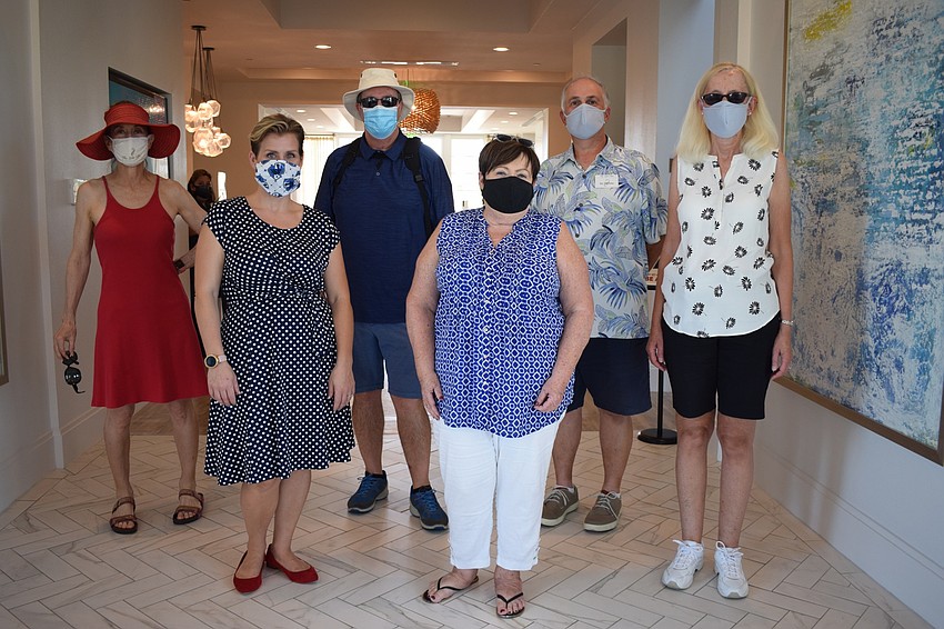 The Lake Club residents Ruth Harshman, Shaina Swan, Bill Mills, Julia Swan and Jay and Marybeth Traverso organize a drive thru fundraiser in support of The Lake Club's Weston Hermann, who has cancer.