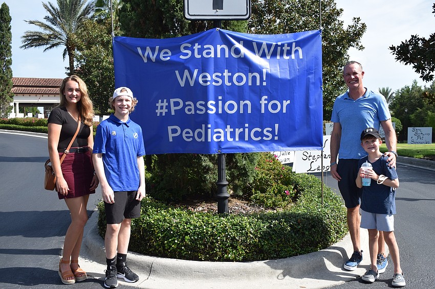 Makenna Hermann, Weston Hermann, Jared Hermann and Grayson Hermann are overwhelmed by the community support for Weston Hermann, who is fighting cancer.