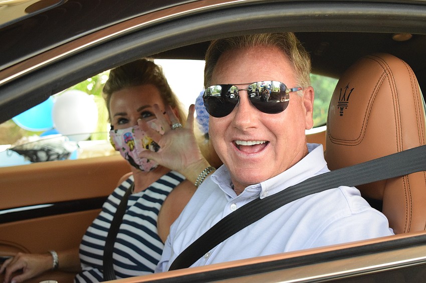 The Lake Club's Traci and Mike Smullen are excited to see Lake Club's Weston Hermann and his family.