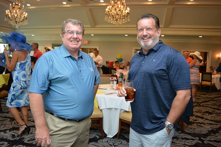 Gold Coast Eagle Distributing's Hugh Shields invited friend Mike Rahn, of Palm Aire.