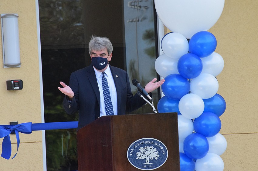 David Mahler, The Out-of-Door Academy's head of school, greets eighth graders for their first day back on campus for the new school year. The eighth graders are the first to use the new middle school facility.