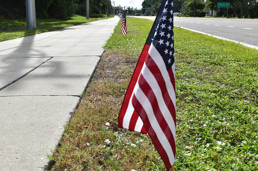 Each year, the town of Longboat Key plants 2,977 American flags along Gulf of Mexico Drive to honor the victims of the 9/11 terrorist attacks.