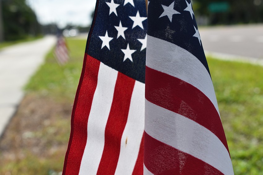 Each year, the town of Longboat Key plants 2,977 American flags along Gulf of Mexico Drive to honor the victims of the 9/11 terrorist attacks.