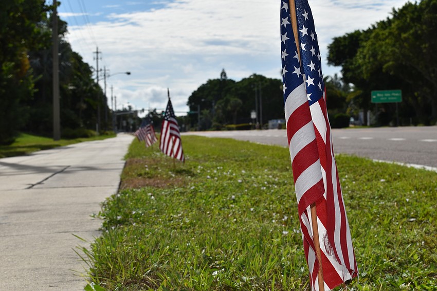 Each year, the town of Longboat Key plants 2,977 American flags along Gulf of Mexico Drive to honor the victims of the 9/11 terrorist attacks.