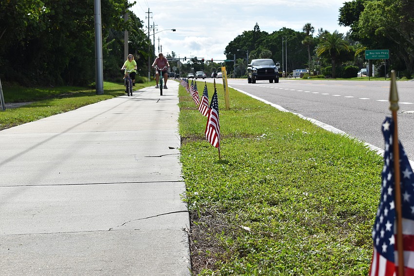 Each year, the town of Longboat Key plants 2,977 American flags along Gulf of Mexico Drive to honor the victims of the 9/11 terrorist attacks.