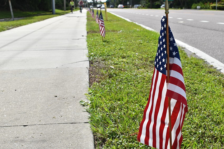 Each year, the town of Longboat Key plants 2,977 American flags along Gulf of Mexico Drive to honor the victims of the 9/11 terrorist attacks.