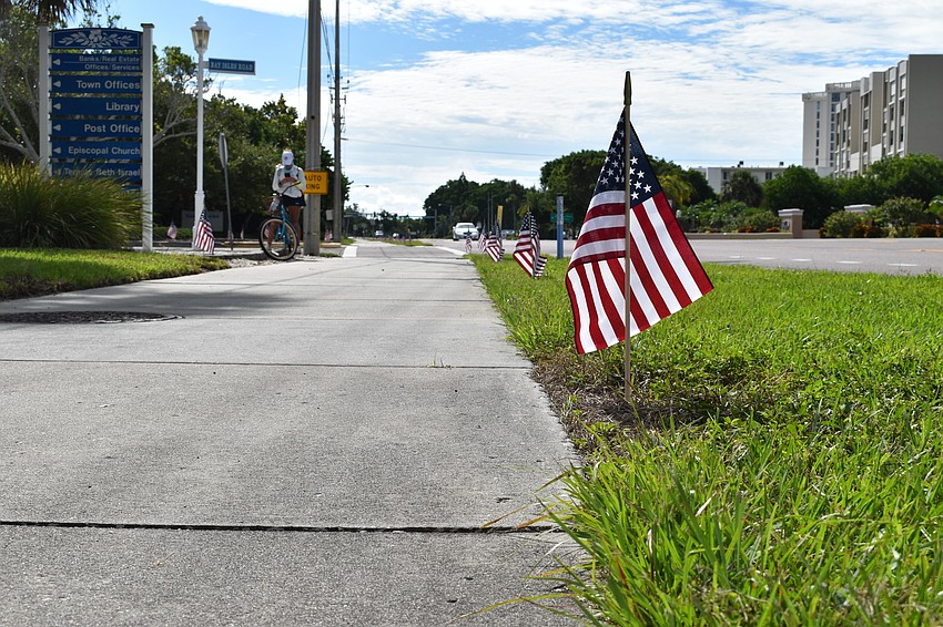 Each year, the town of Longboat Key plants 2,977 American flags along Gulf of Mexico Drive to honor the victims of the 9/11 terrorist attacks.