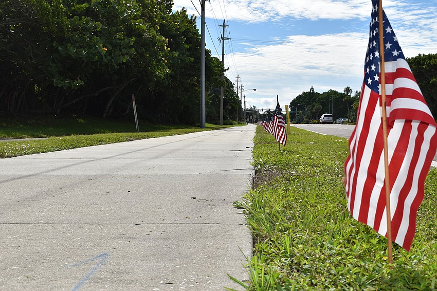 Each year, the town of Longboat Key plants 2,977 American flags along Gulf of Mexico Drive to honor the victims of the 9/11 terrorist attacks.