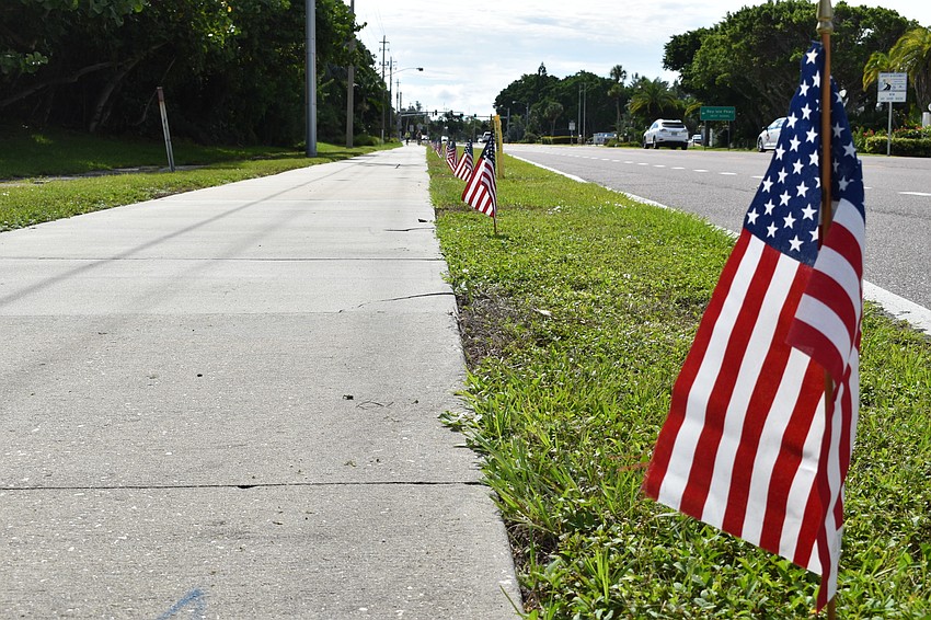Each year, the town of Longboat Key plants 2,977 American flags along Gulf of Mexico Drive to honor the victims of the 9/11 terrorist attacks.