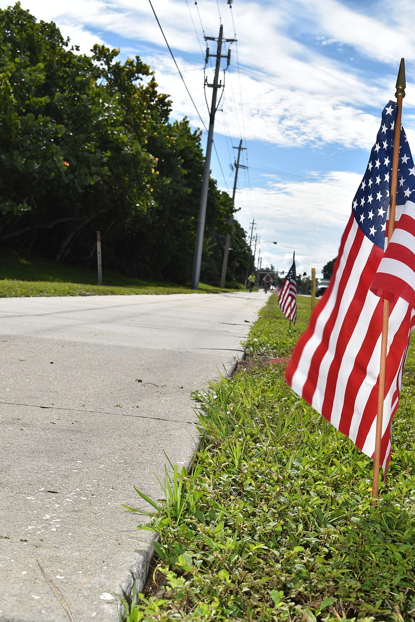 Each year, the town of Longboat Key plants 2,977 American flags along Gulf of Mexico Drive to honor the victims of the 9/11 terrorist attacks.