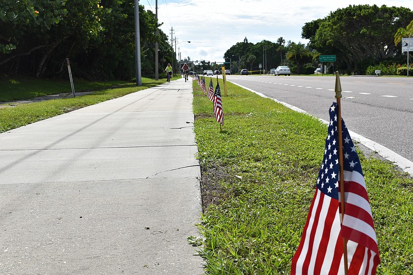 Each year, the town of Longboat Key plants 2,977 American flags along Gulf of Mexico Drive to honor the victims of the 9/11 terrorist attacks.