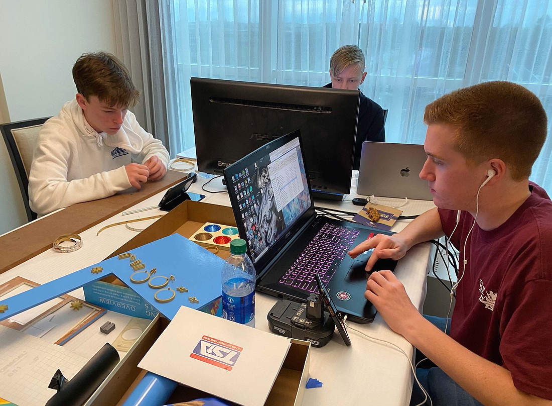 Braden River High School seniors Trey deCarle, Jackson Galvin and Griffin Hudson work on a Technology Student Association project. Courtesy photo.