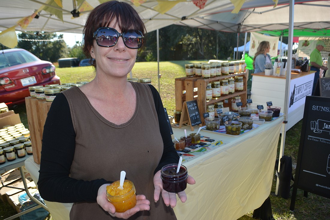 Lisa Fulk of Sunshine Canning sells goods at The Market at Lakewood Ranch. The Market will return in November. File photo.