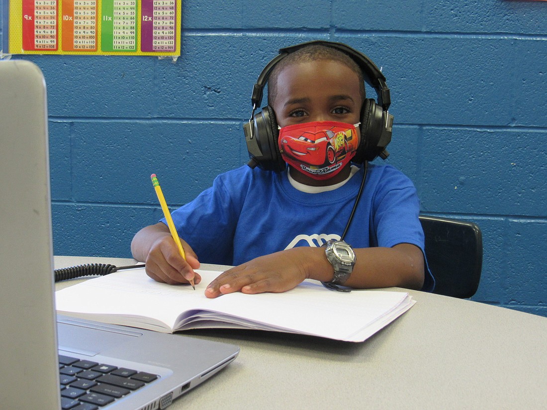 Jeffrey, a first grade student at Emma E. Booker Elementary, works through his school day at the Boys & Girls Club of Sarasota County. Photo courtesy
