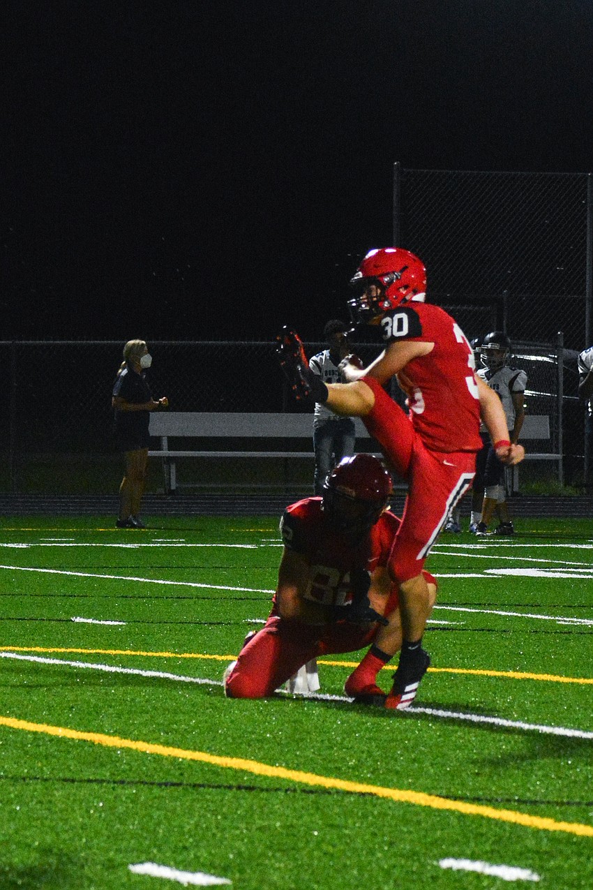 Cardinal Mooney kicker Pierse Stainton was perfect on his extra points against North Port.