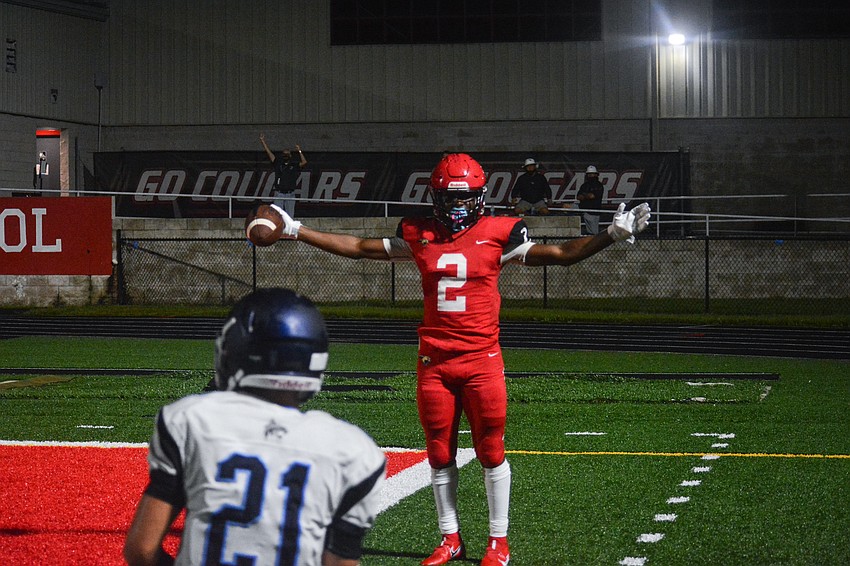 Cougars running back Lauriel 