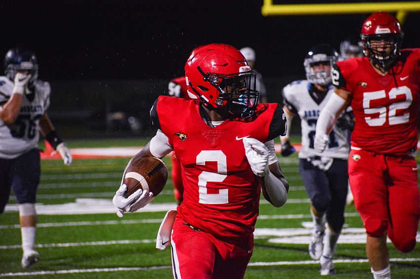 Cougars running back Lauriel 