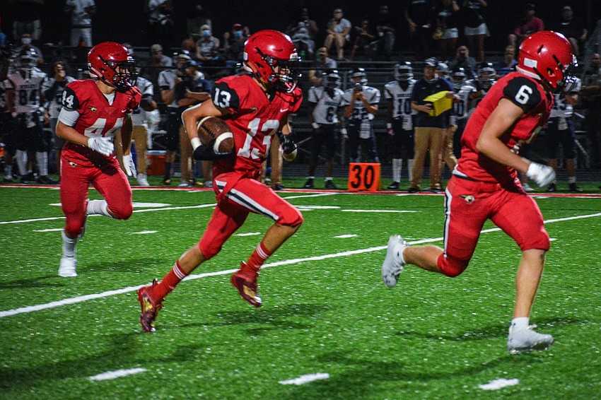 Cardinal Mooney defensive back Charlie Cooper had an interception on the first drive of the game.