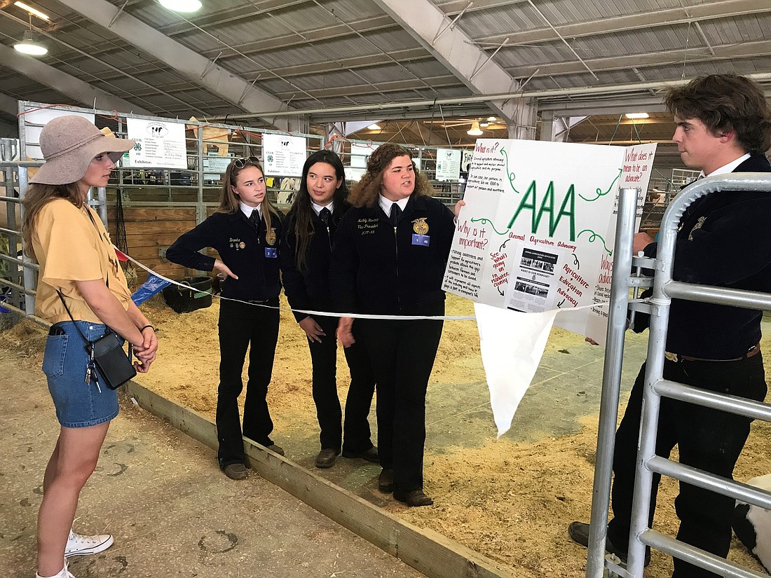 Lakewood Ranch High FFA members Brooke Oâ€™Neill, Madeline Fields, Maddy Hartwig and Nathan Sundberg promote the importance of animal agriculture and hands-on projects. Courtesy photo.