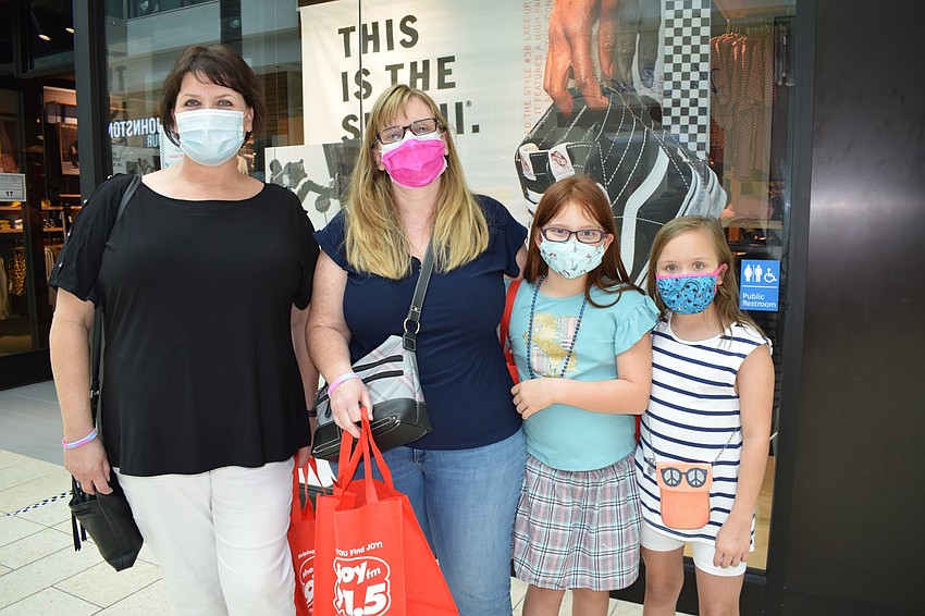 Tara's Martha Atkins and Sara Alva enjoy spending time at the expo with their daughters Savannah Alva and Melanie Atkins, who are both 9 years old.