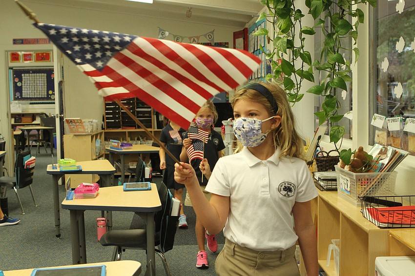 Lulu Leiter waved the flag.