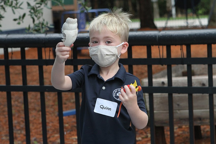 Quinn McAloon picked out fossils and shells.