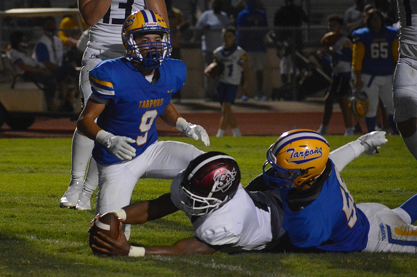 Jaheim Hodo stretches the ball across the goal line for a touchown. Hodo finished with 112 yards on nine carries.