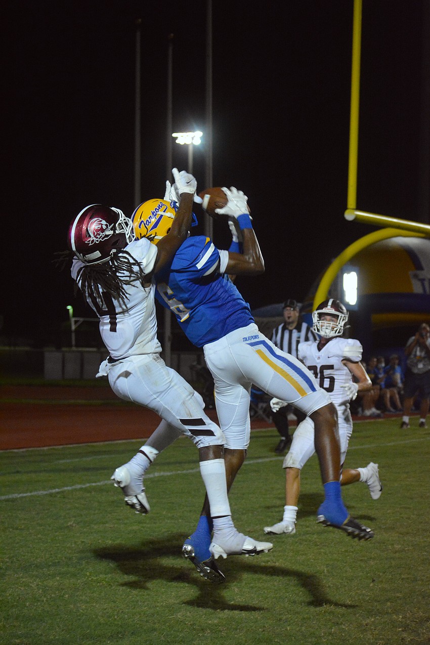 Charlotte receiver John Gamble snags a touchdown from John Busha to put the game out of reach.