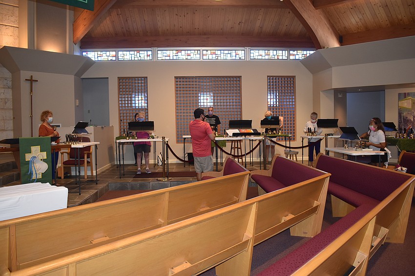 The musicians spread out around their usual spot.