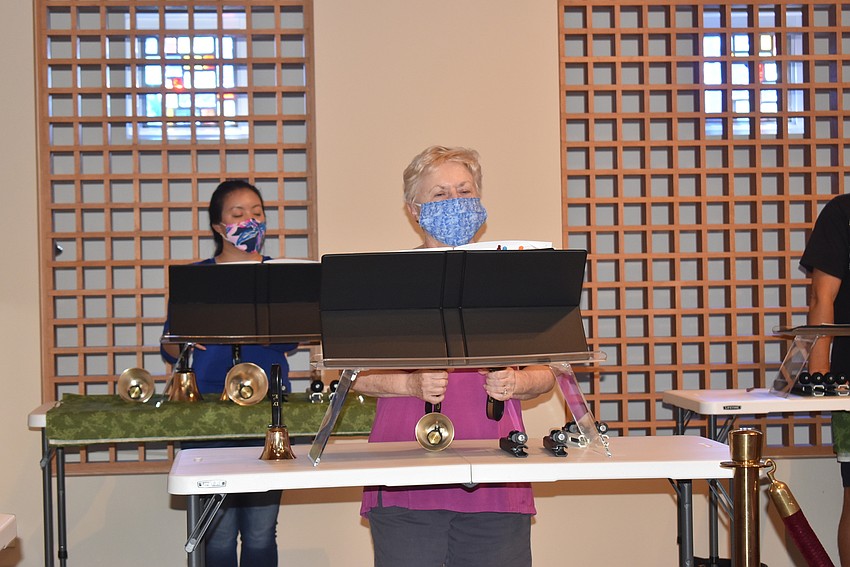 Julia White and Denise Watermeier watch for instruction from Bodnyk.