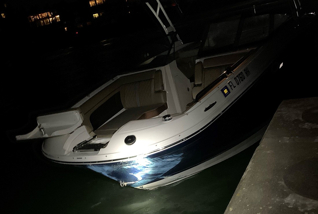 Eight people were aboard the 27-foot powerboat that hit the concrete groin on Saturday.