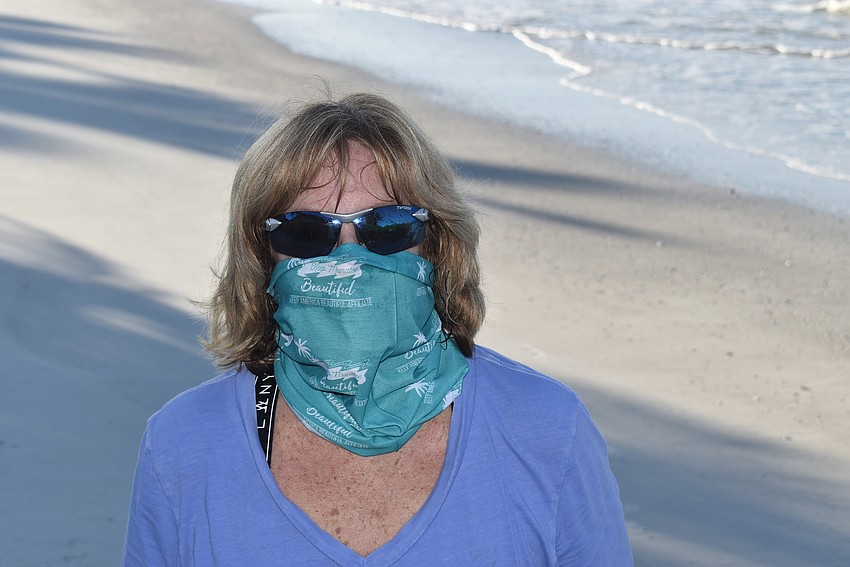 Laurel Phillips wears her Keep Manatee Beautiful buff.