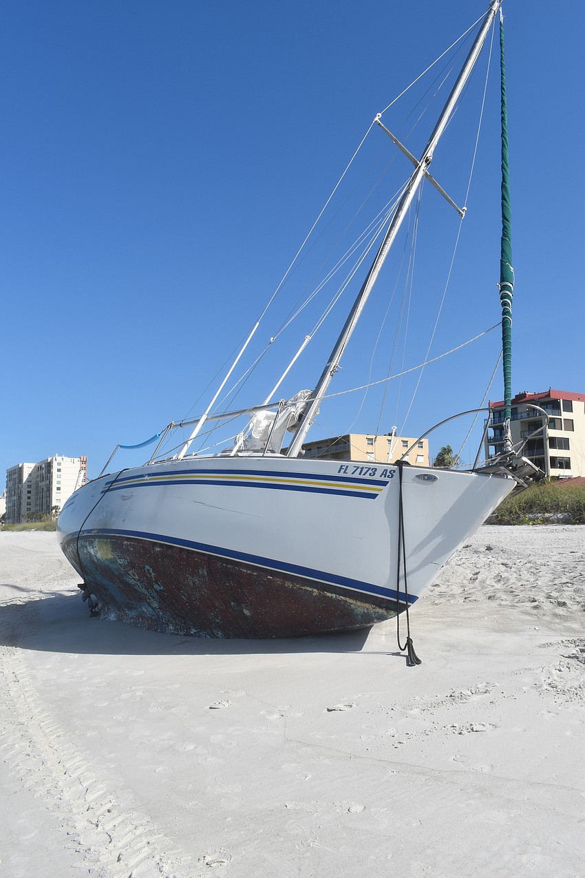 Mark Sternal's sailboat washed ashore near 4239 Gulf of Mexico Drive.