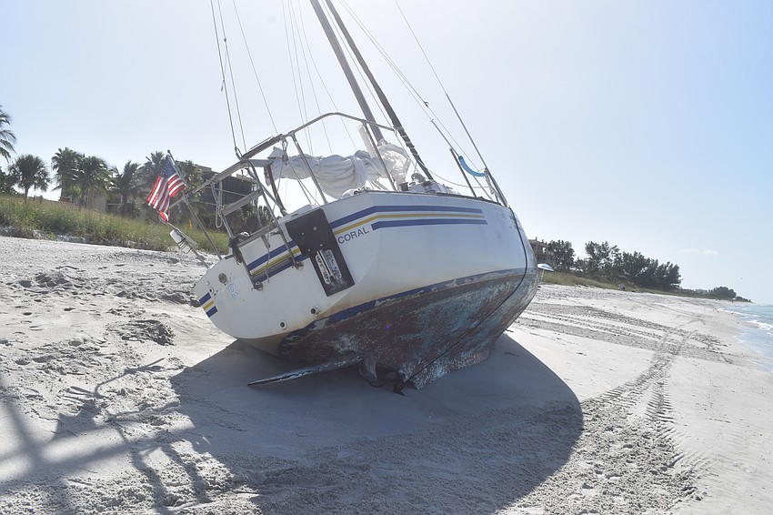 Mark Sternal's sailboat washed ashore near 4239 Gulf of Mexico Drive.