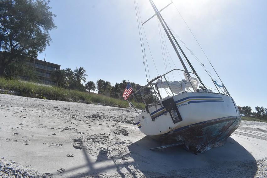 Mark Sternal's sailboat washed ashore near 4239 Gulf of Mexico Drive.