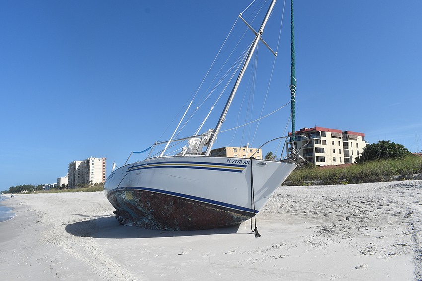Mark Sternal's sailboat washed ashore near 4239 Gulf of Mexico Drive.