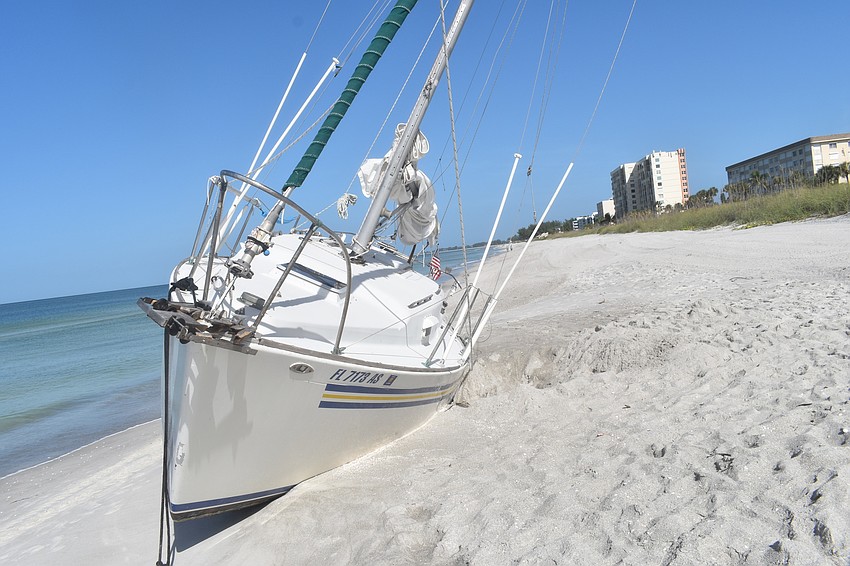 Mark Sternal's sailboat washed ashore near 4239 Gulf of Mexico Drive.