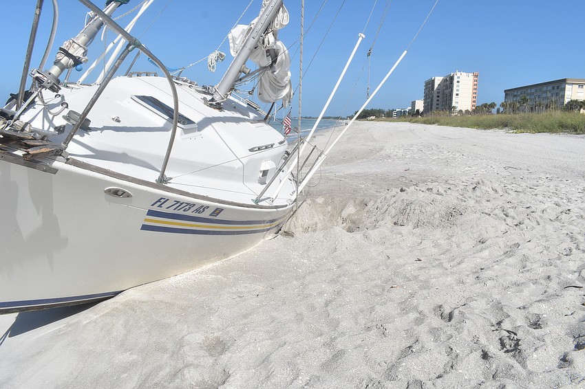 Mark Sternal's sailboat washed ashore near 4239 Gulf of Mexico Drive.