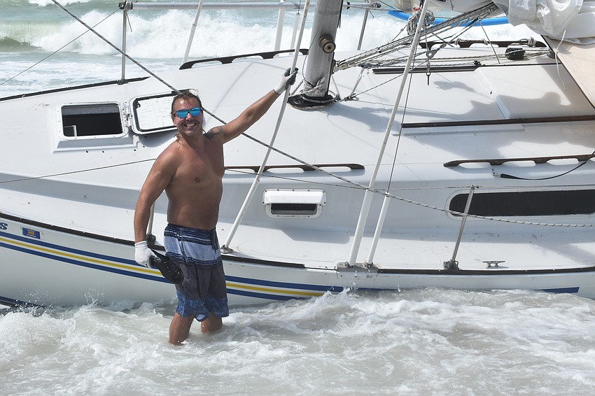 Mark Sternal's sailboat washed ashore near 4239 Gulf of Mexico Drive.