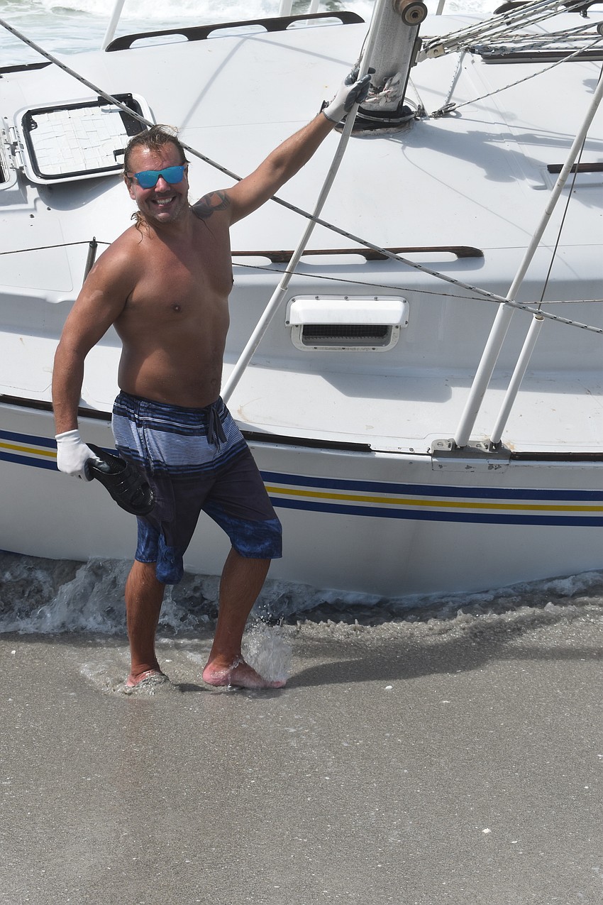 Mark Sternal's sailboat washed ashore near 4239 Gulf of Mexico Drive.