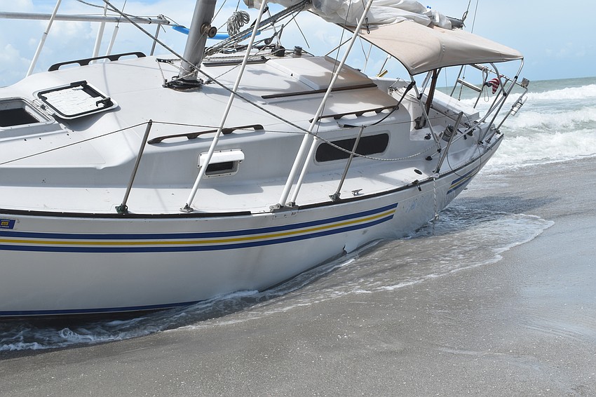 Mark Sternal's sailboat washed ashore near 4239 Gulf of Mexico Drive.