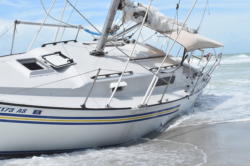 Mark Sternal's sailboat washed ashore near 4239 Gulf of Mexico Drive.