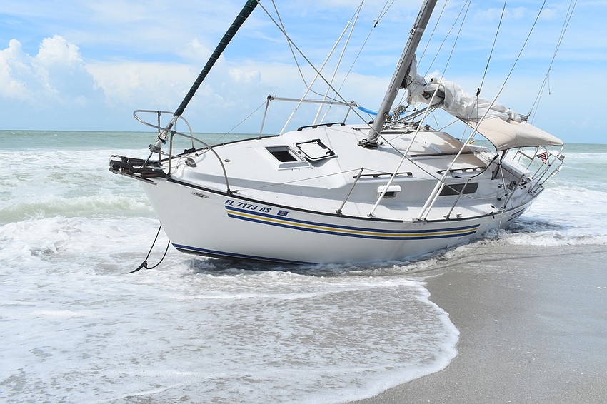 Mark Sternal's sailboat washed ashore near 4239 Gulf of Mexico Drive.